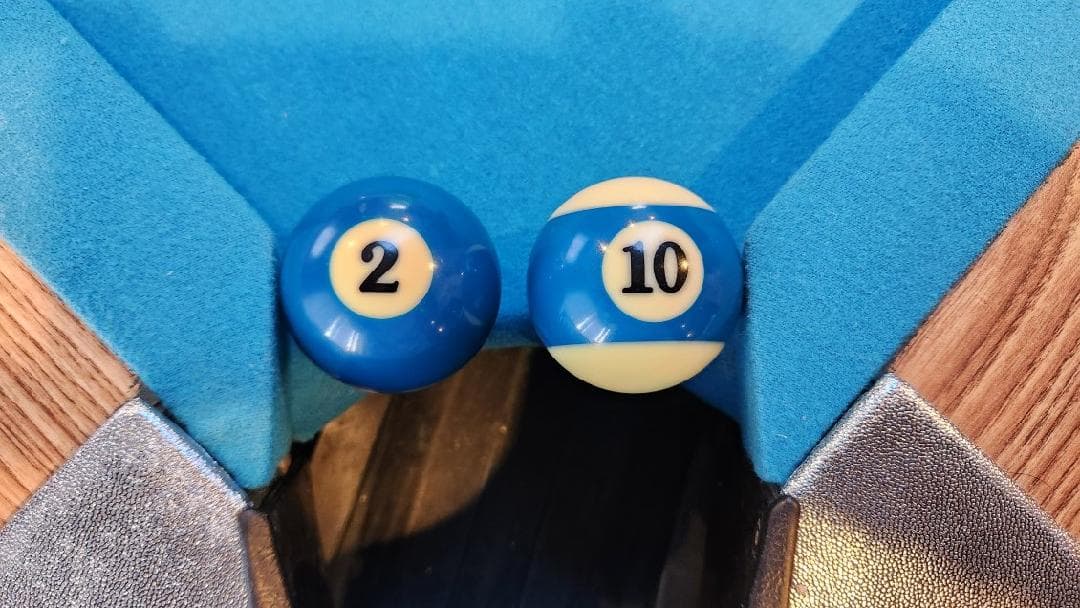 Close-up of balls at Dynamo pocket edge with TruShim